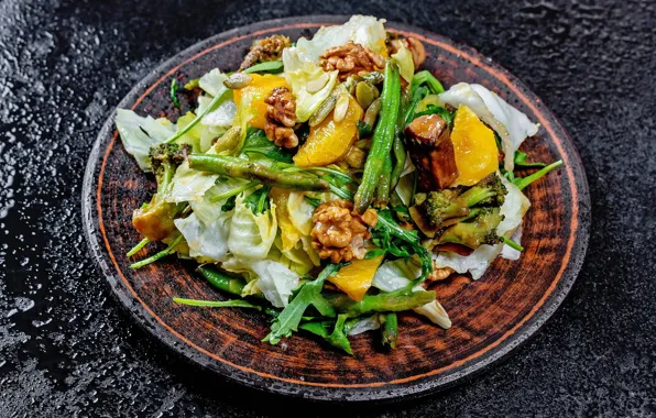 Oranges, nuts, cabbage, salad