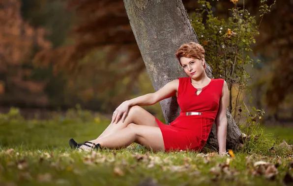 Picture grass, leaves, tree, feet, woman, red dress, direct look