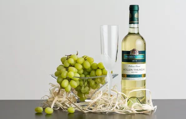 Glass, grapes, white wine