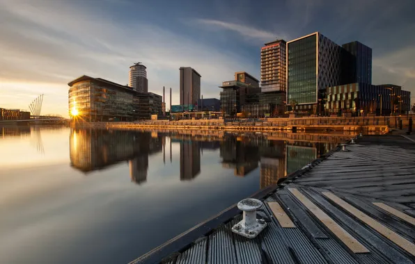 Sunset, the city, pier