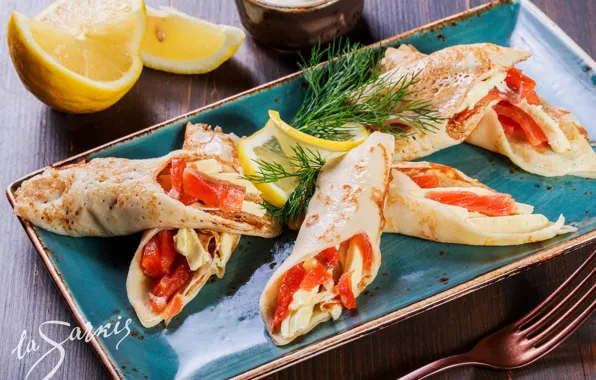 Lemon, pancakes, salmon, rolls