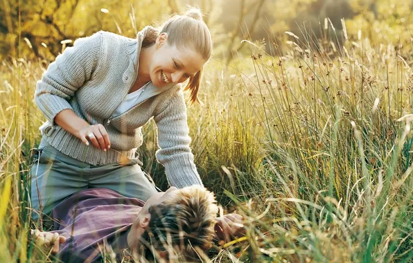 Field, grass, girl, laughter, guy, smile, fun