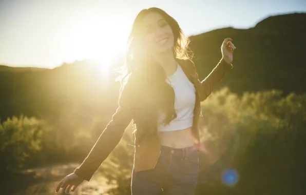 Picture the sun, smile, jeans, brunette