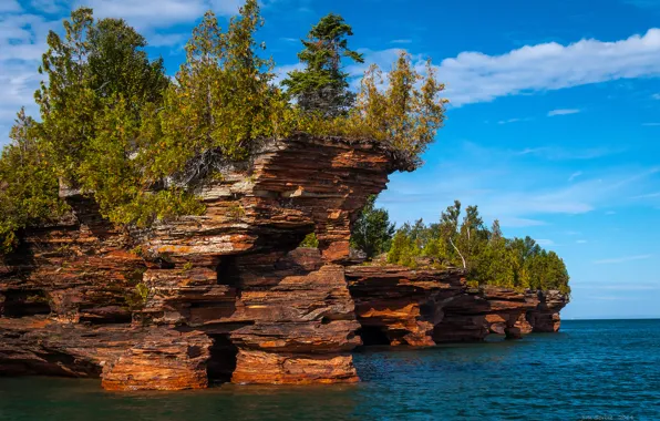 Sea, the sky, trees, rocks