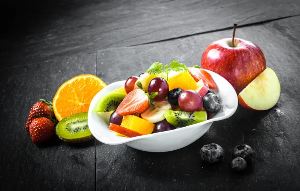 Berries, apples, oranges, kiwi, blueberries, strawberry, grapes, bowl