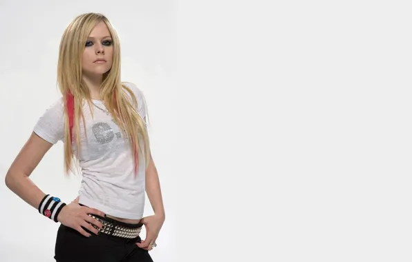 Girl, Avril Lavigne, on a white background, looking at the camera, famous rock singer, the …