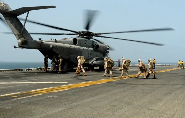 Picture the ocean, soldiers, deck, helicopter, military transport, Sikorsky, Aero, heavy