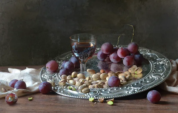 Wine, glass, grapes, pistachios