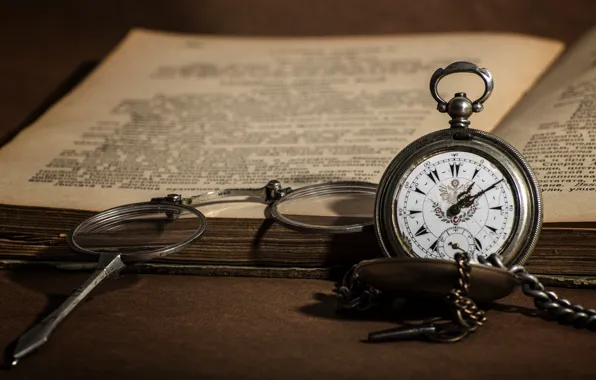 Glasses, book, pocket watch, binoculars