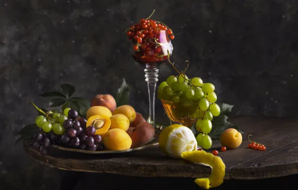 Leaves, berries, the dark background, table, lemon, glass, grapes, fruit