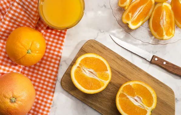 Oranges, knife, cutting Board