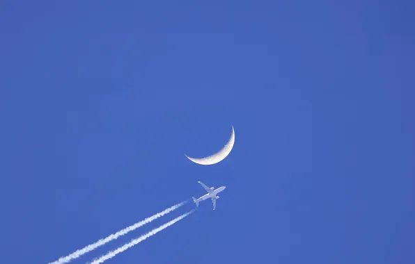 The sky, the moon, the plane