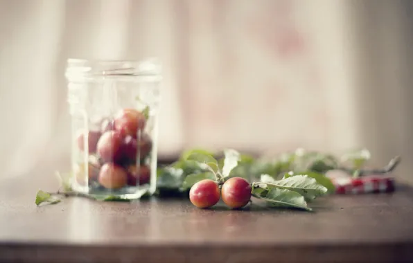Glass, bokeh, cherry plum fruit