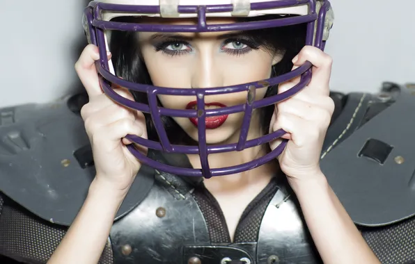 Picture American football, pearls, sexy look, protective gear