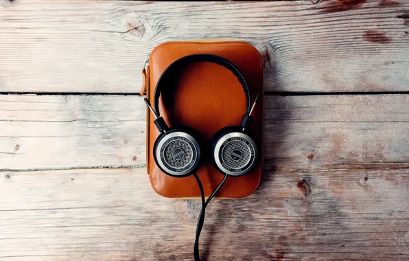 Music, headphones, bag, wooden background