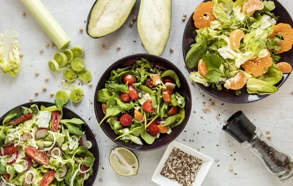 Eggplant, tomatoes, salad, tangerines, bowls