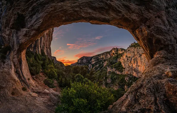 The sky, sunset, mountains, stones, rocks, view, arch, cave