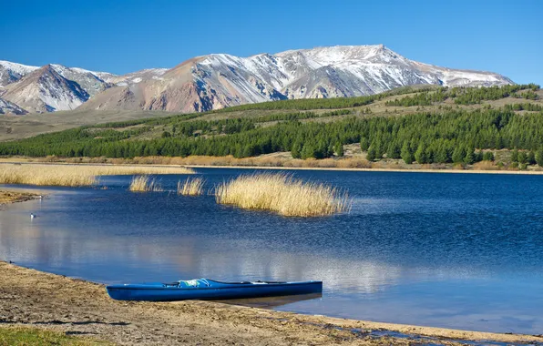 The sky, trees, mountains, lake, boat