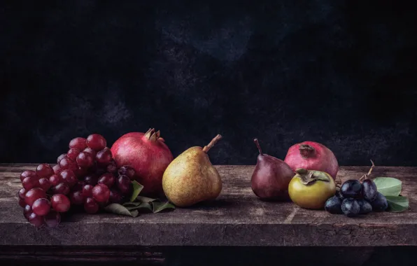 Picture grapes, pear, garnet, persimmon