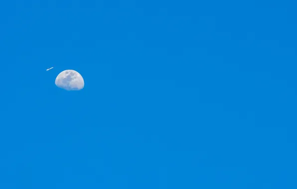 Picture the sky, the plane, planet, The moon