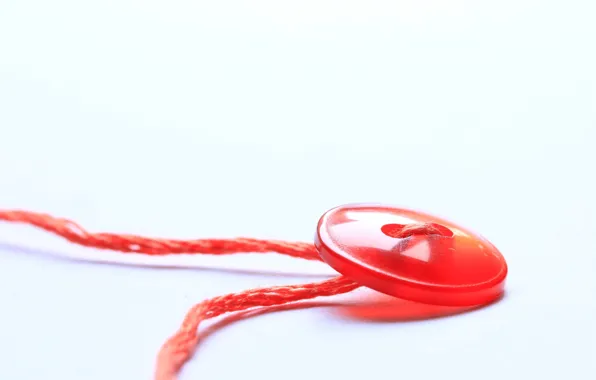 Picture seamstress, thread, button