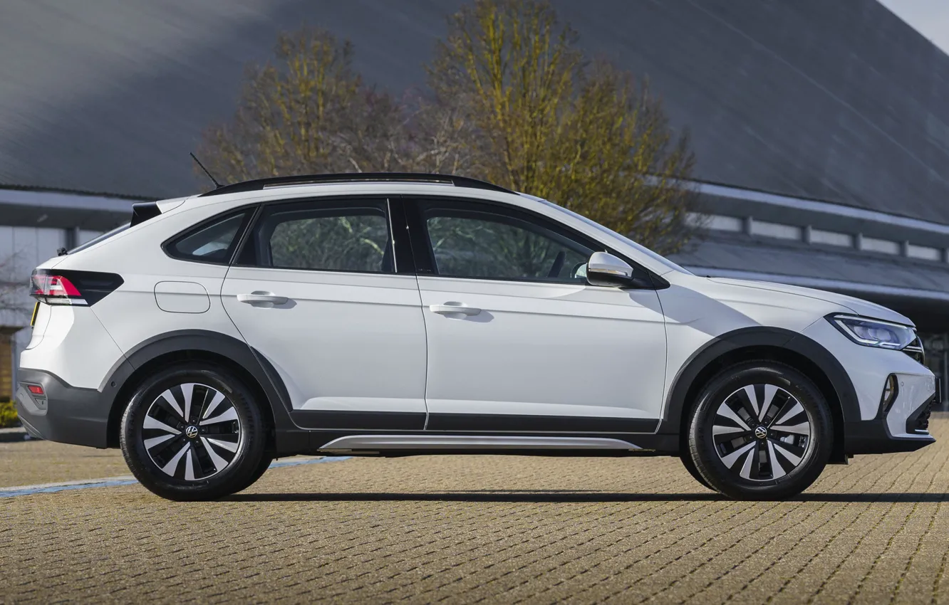 Photo wallpaper Volkswagen Taigo, for UK, side view