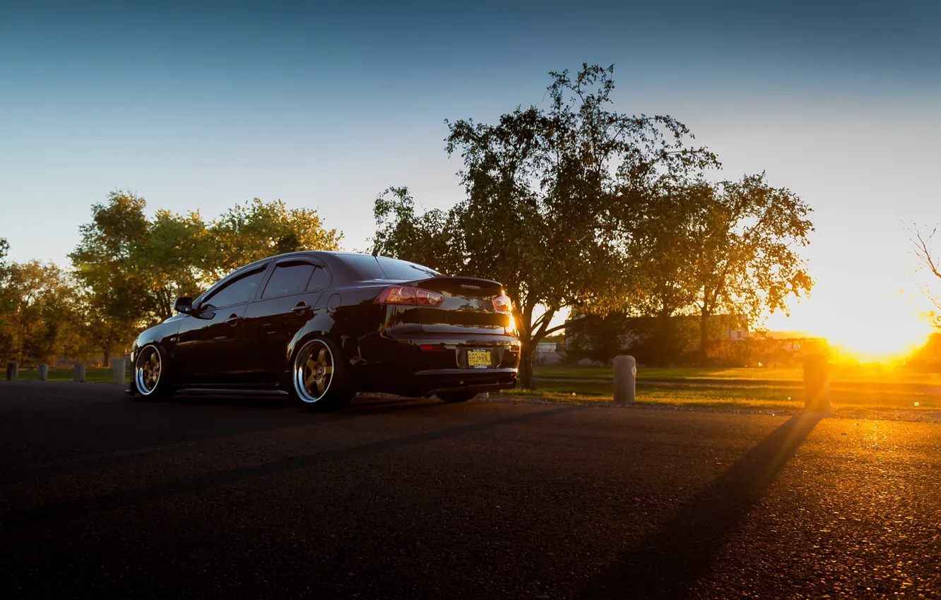 Photo wallpaper road, the sky, the sun, trees, sunset, shadow, wheel, Mitsubishi