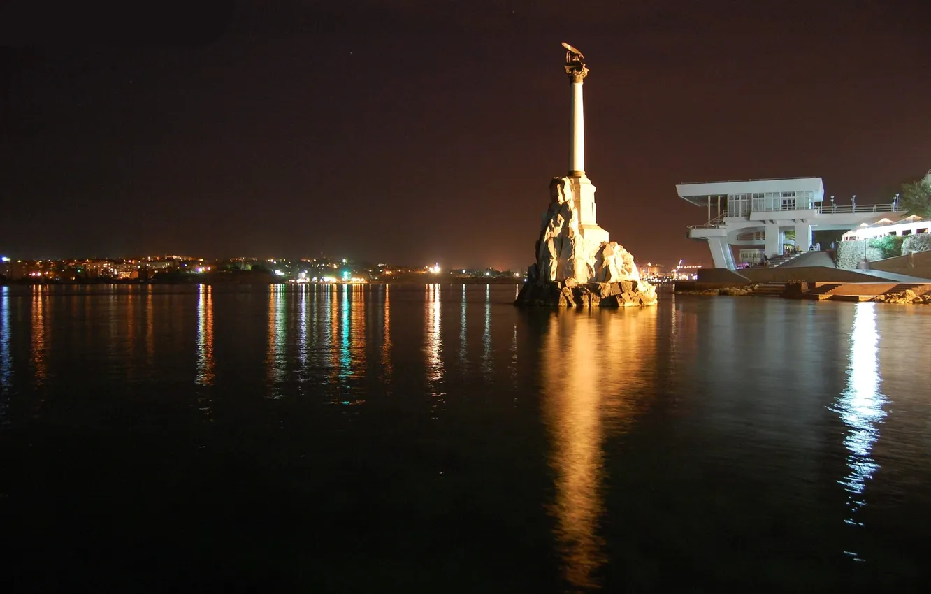 Photo wallpaper sea, water, light, the city, lights, reflection, the evening, hero