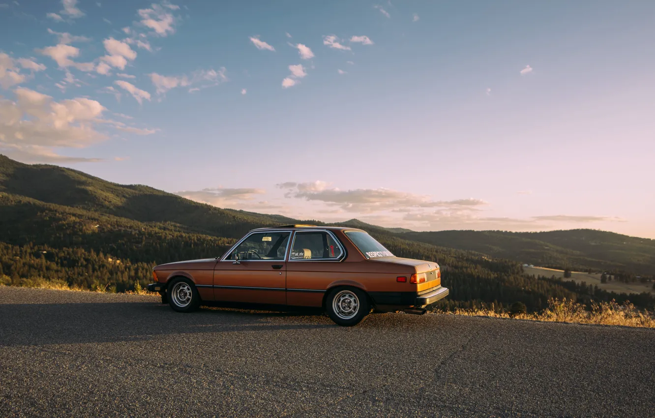 Photo wallpaper road, the sun, clouds, trees, mountains, shadow, BMW, valley