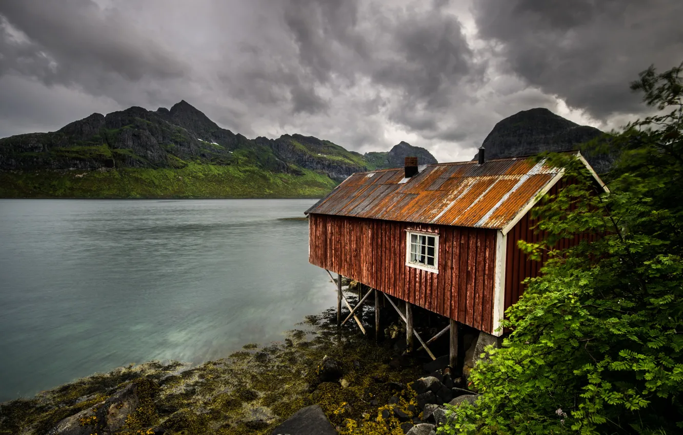 Photo wallpaper sea, mountains, clouds, stones, shore, home, Norway
