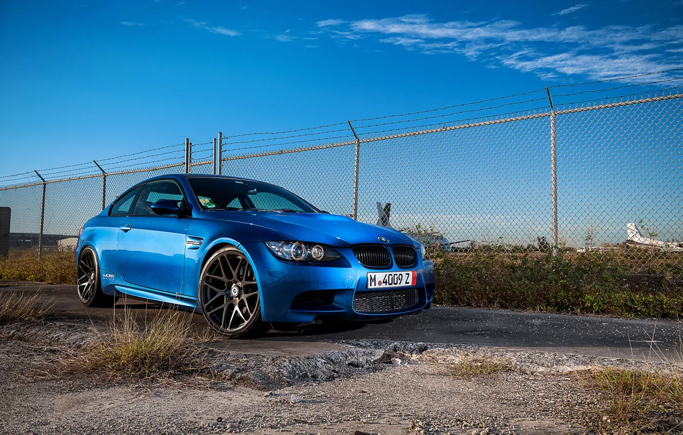 Photo wallpaper the sky, clouds, blue, bmw, BMW, the fence, front view, blue