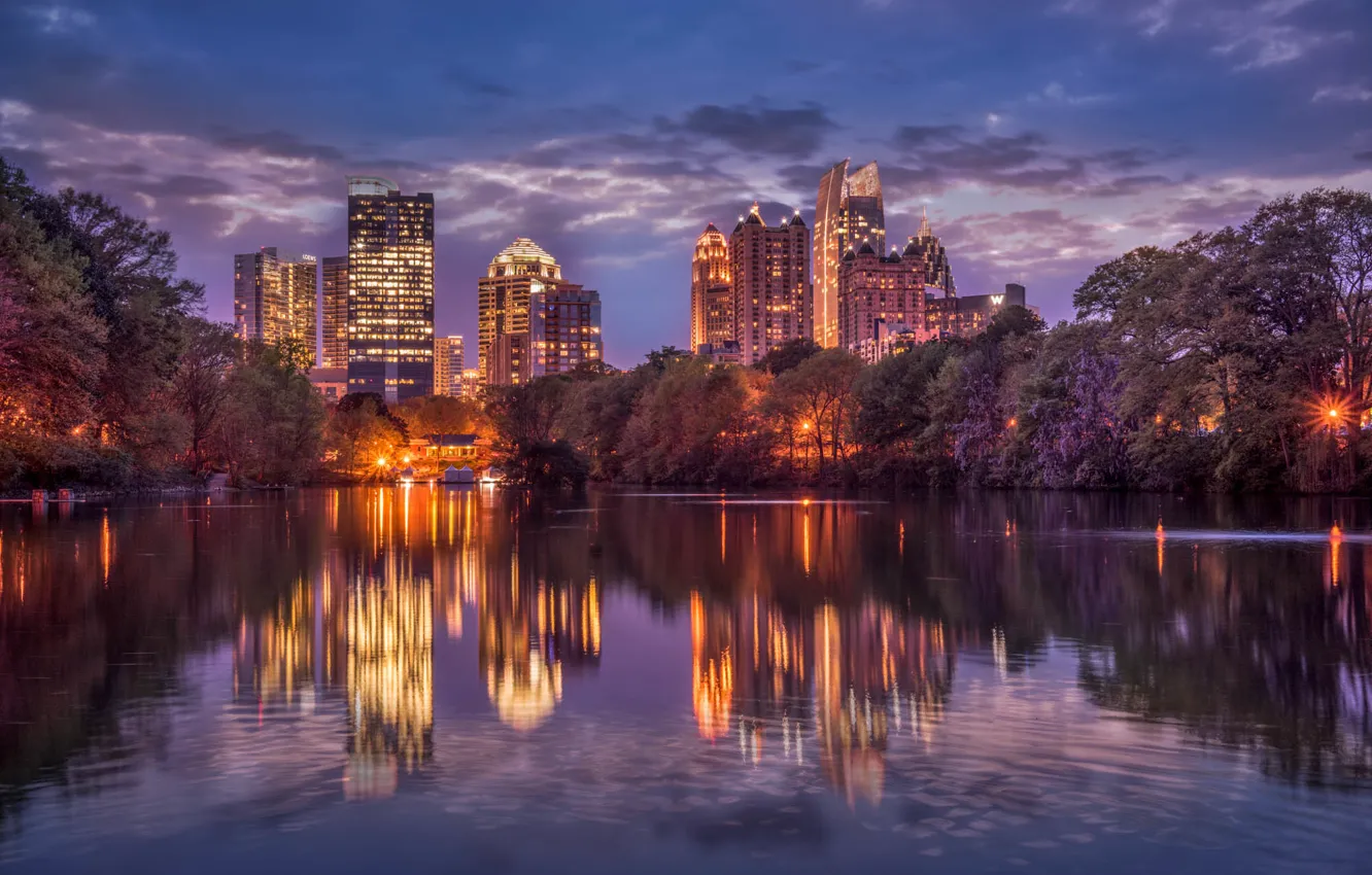 Photo wallpaper the sky, clouds, trees, night, the city, lights, reflection, river