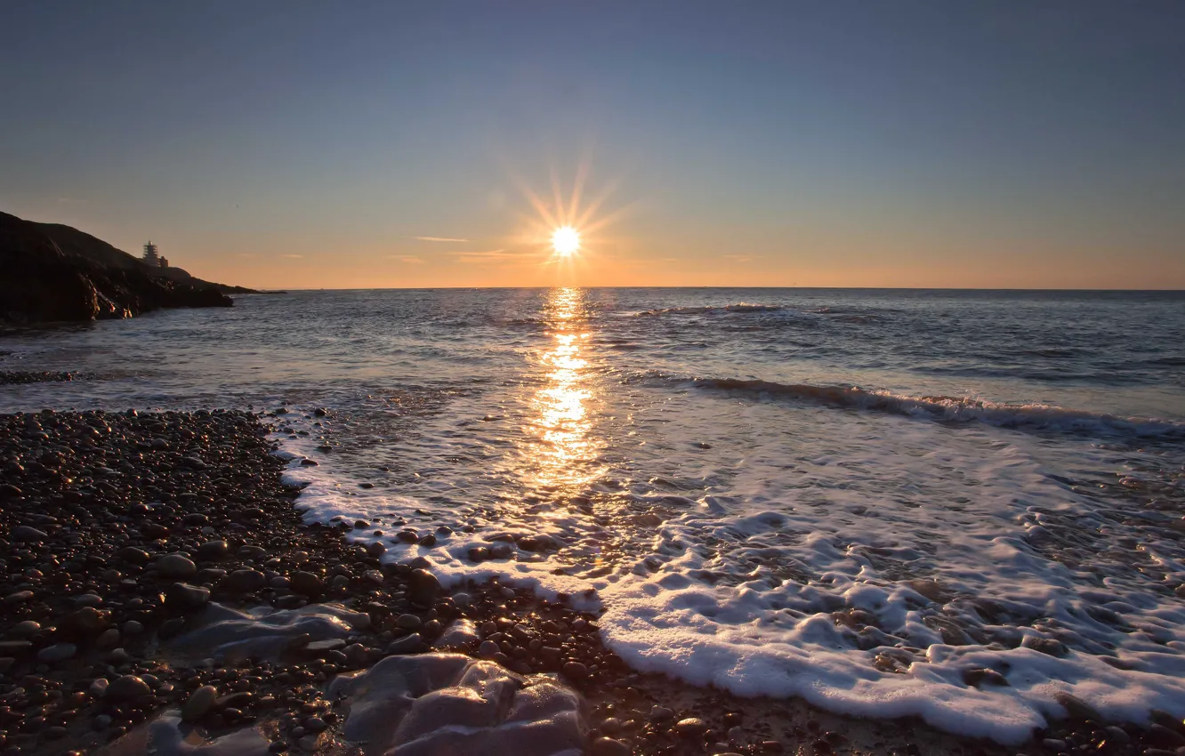 Photo wallpaper sea, wave, beach, foam, the sun, pebbles, stones, dawn