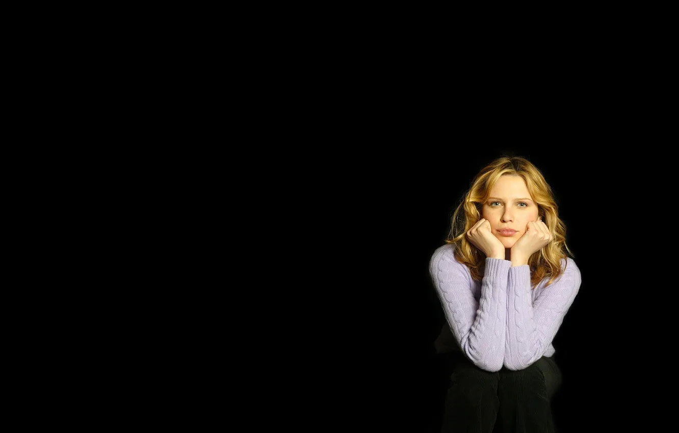 Photo wallpaper the dark background, blonde, black background, jacket, sitting, Sara Foster, looks, Sarah Foster