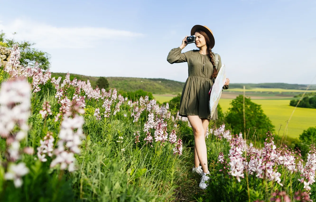 Photo wallpaper field, girl, flowers, hat, the camera, walk
