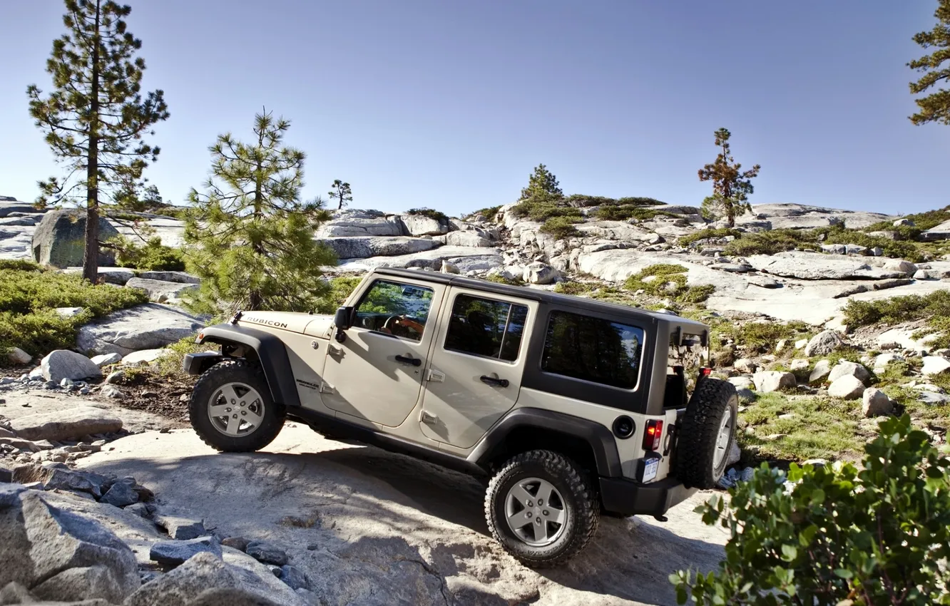 Photo wallpaper the sky, trees, mountains, stones, rocks, SUV, Jeep, side view