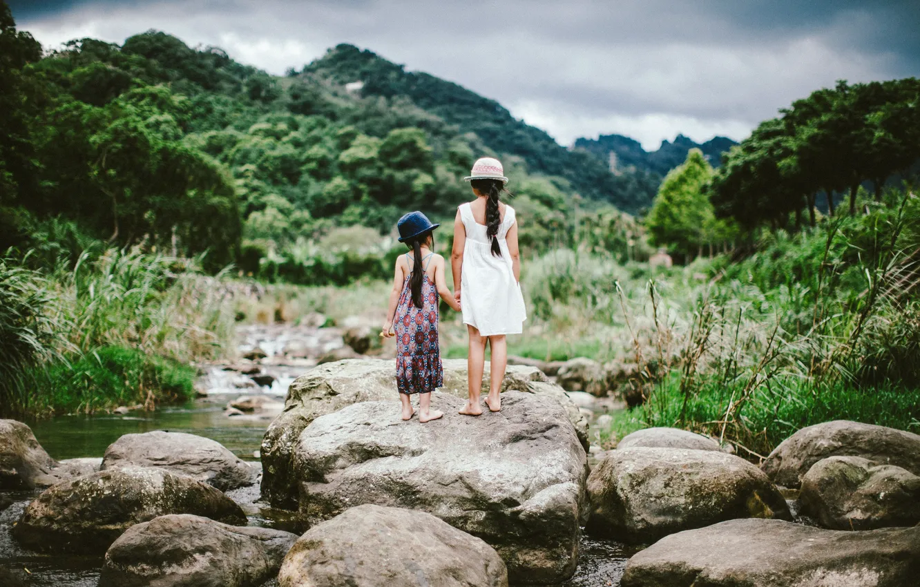 Photo wallpaper grass, water, nature, children, stones, hills, hat, girl