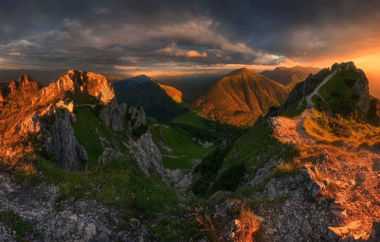 Photo wallpaper sunset, mountains, clouds, stones