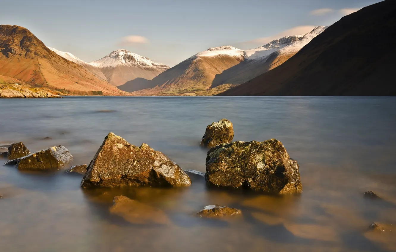 Photo wallpaper snow, mountains, lake, stones, hills, tops, boulders