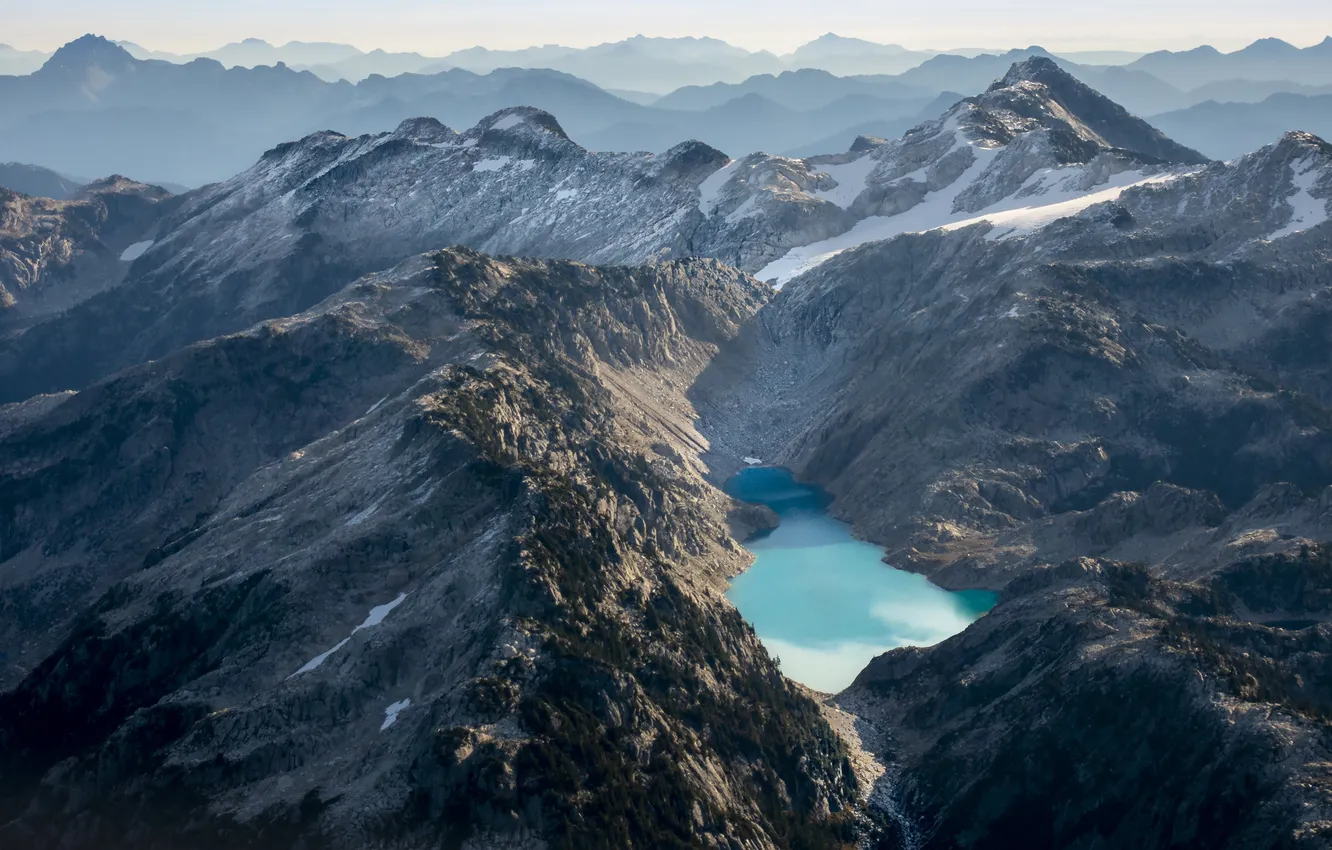 Photo wallpaper snow, mountains, fog, lake, rocks, shore, tops, view