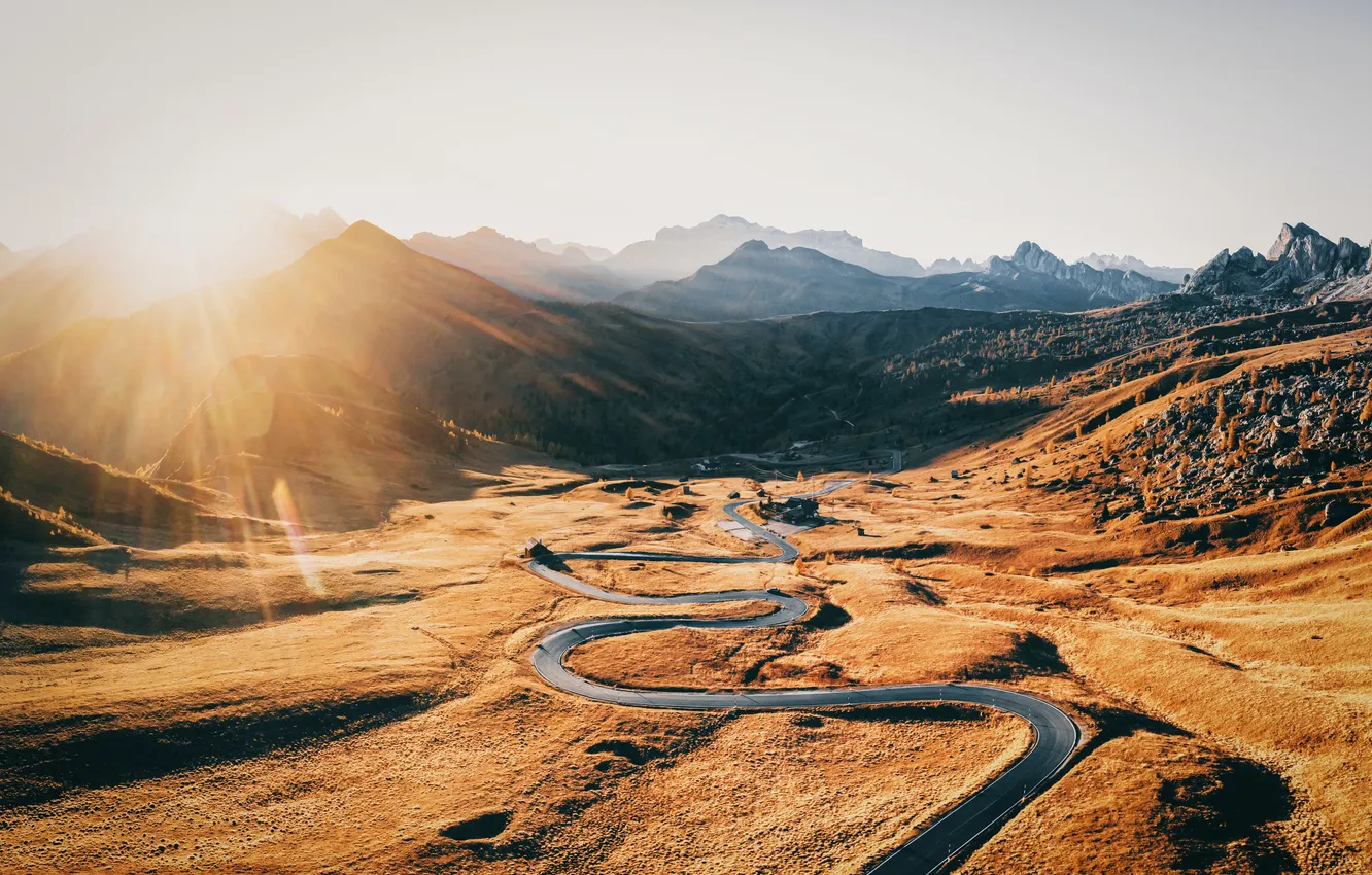 Photo wallpaper road, sunset, mountains, The foot of the mountains