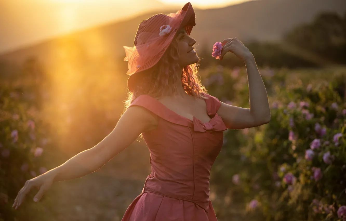 Photo wallpaper girl, the sun, rays, joy, happiness, sunset, flowers, nature