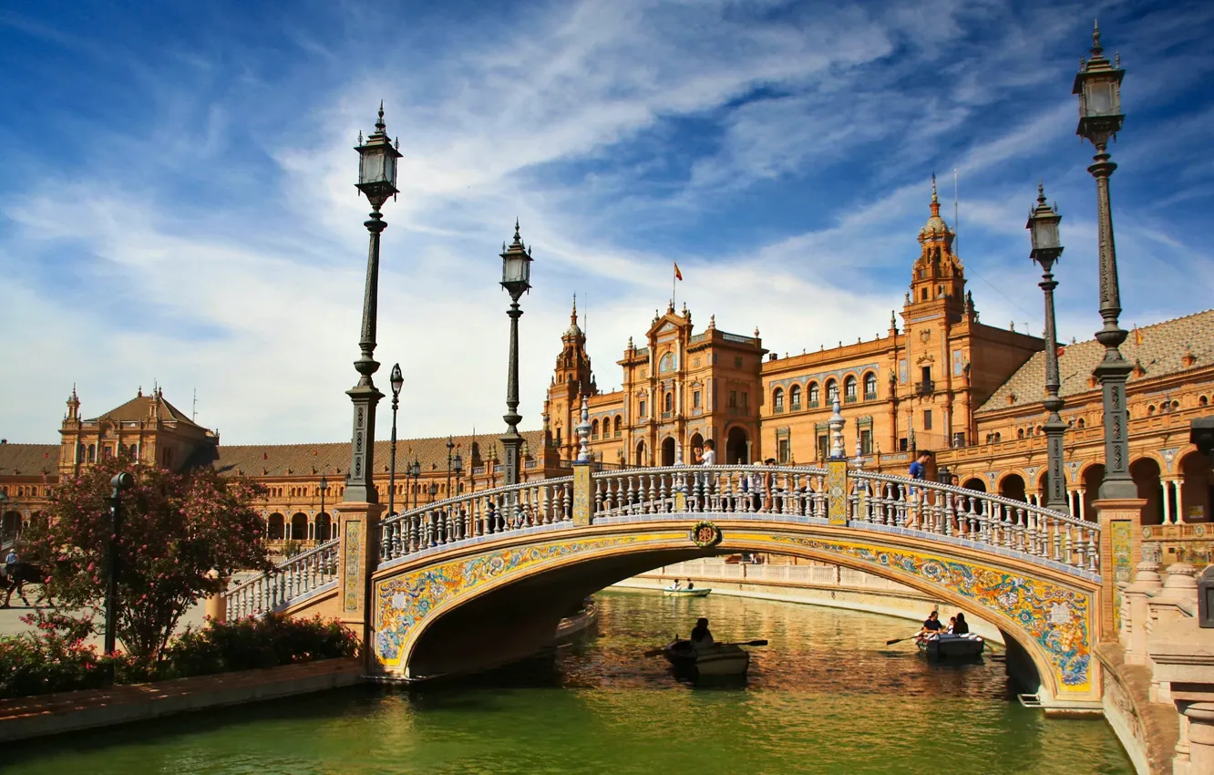 Photo wallpaper bridge, river, boats, lights, Spain, Spain, Seville, Andalusia