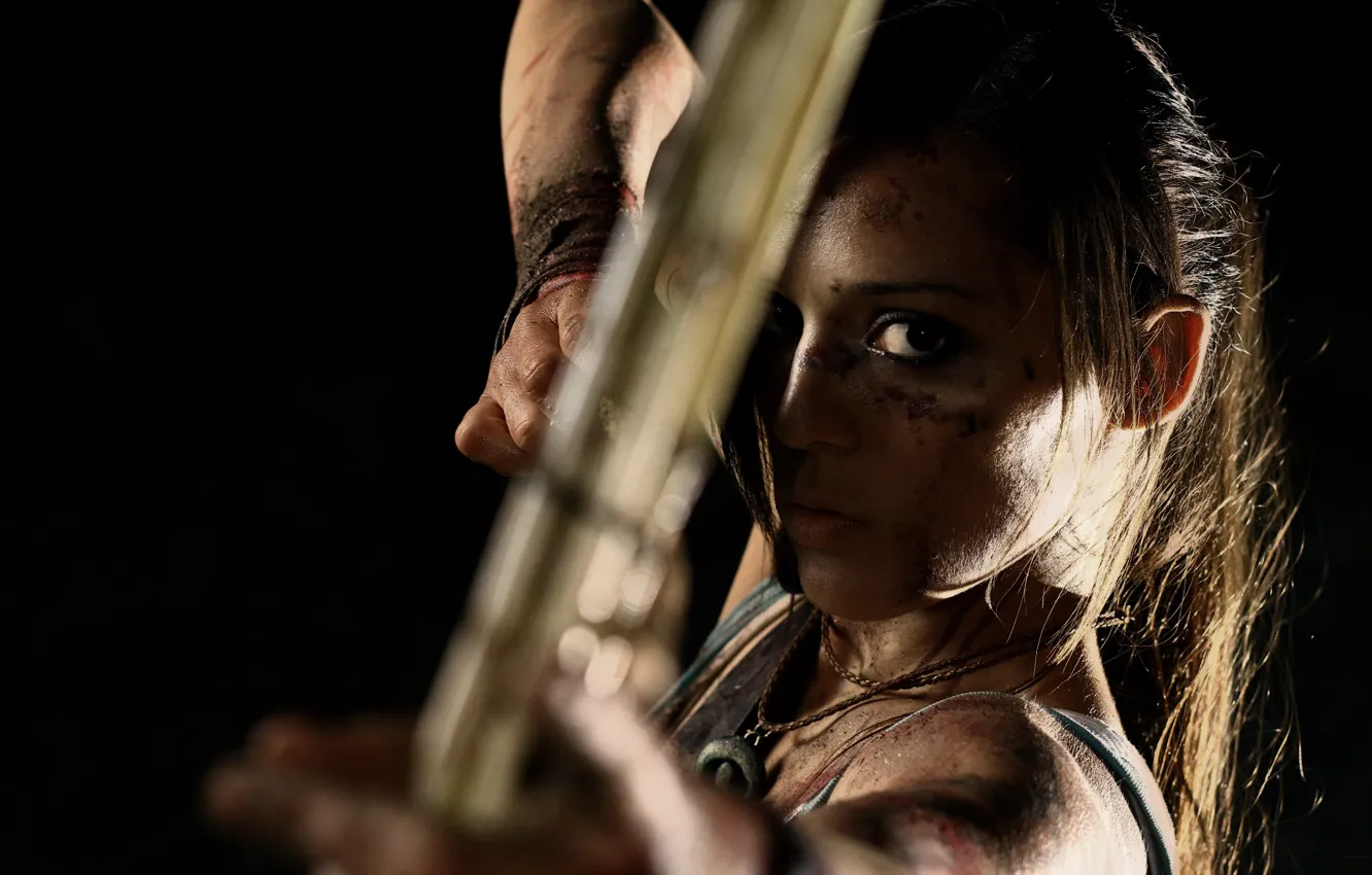 Photo wallpaper look, girl, face, weapons, bow, dirt, Tomb Raider, black background