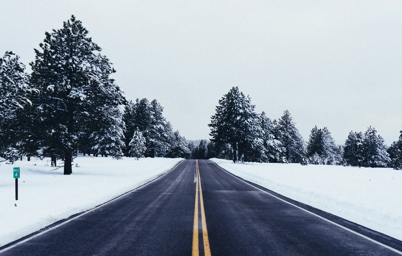 Photo wallpaper winter, road, forest, the sky, asphalt, clouds, snow, trees