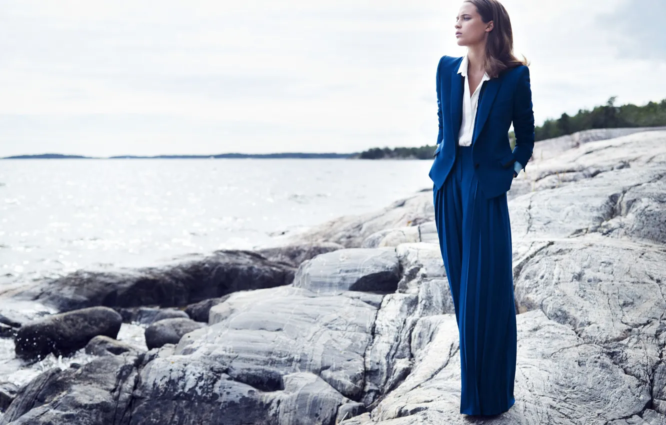 Photo wallpaper girl, stones, coast, costume, pants, Alicia Vikander, Alicia Vikander