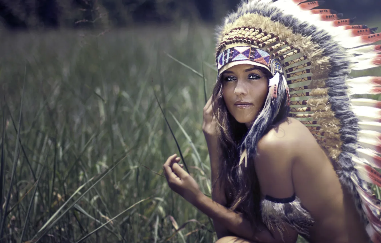 Photo wallpaper grass, look, girl, blur, feathers, headdress