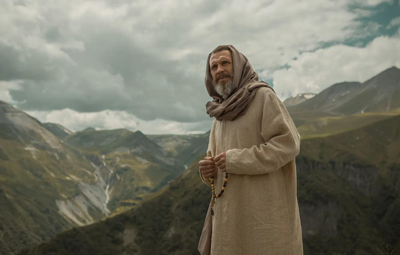 Photo wallpaper the sky, clouds, mountains, traveler, the wanderer, rosary, Shepeleva Tatiana, The bearded man