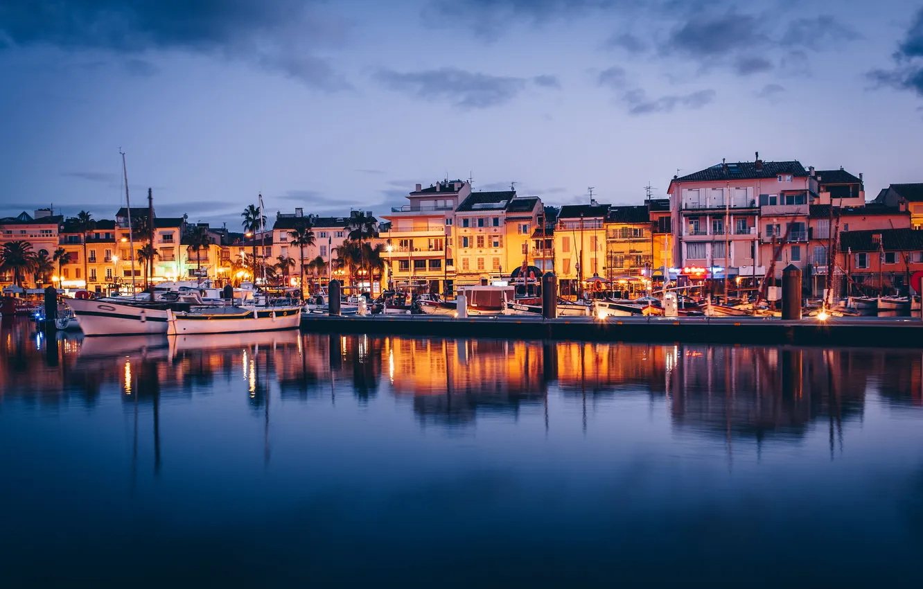 Photo wallpaper clouds, the city, lights, reflection, river, blue, shore, boat