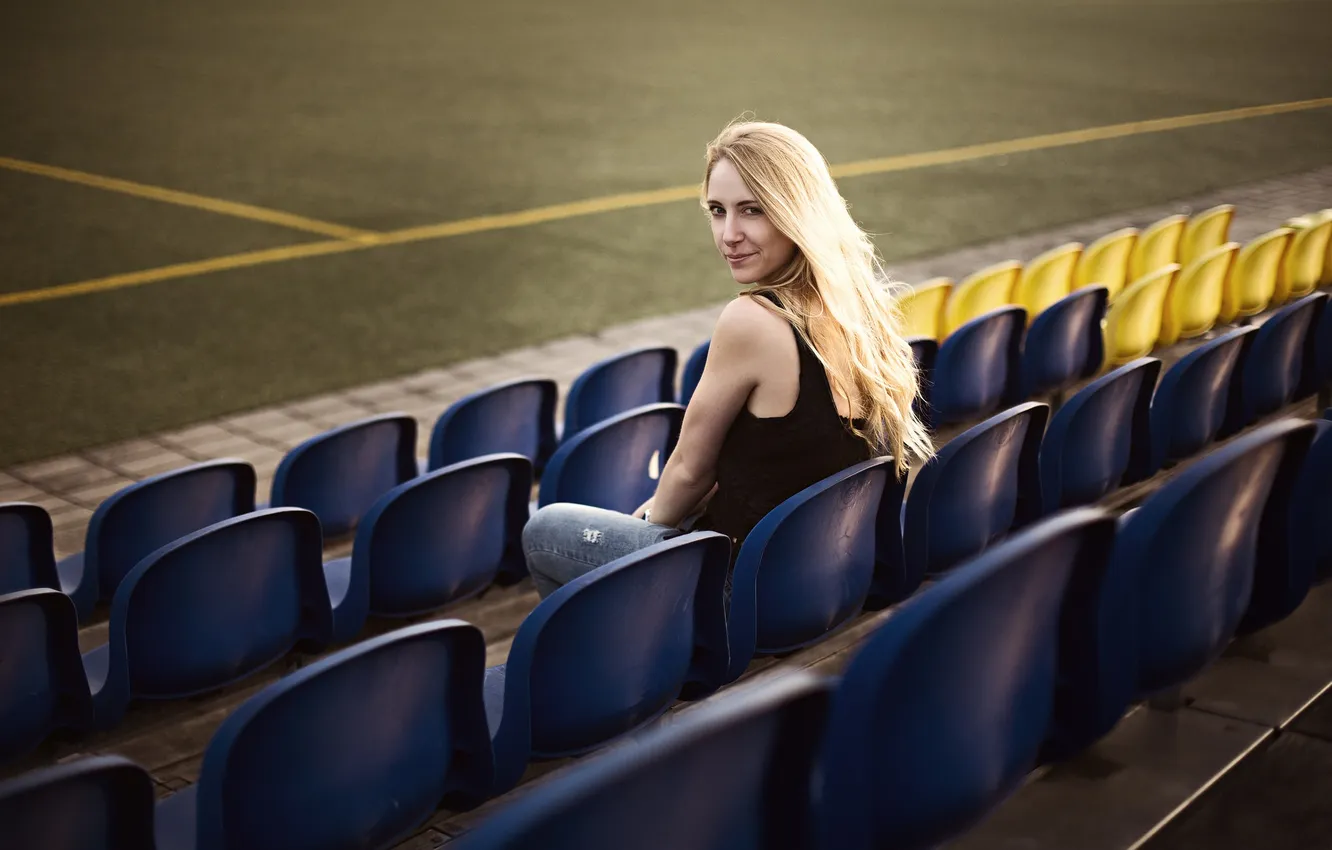 Photo wallpaper girl, face, hair, seat, stadium